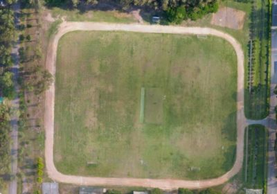 Football/Cricket field with a running track